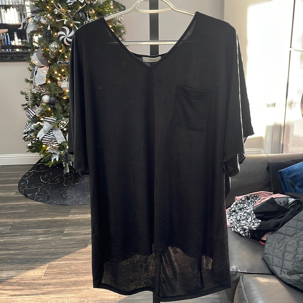 Black shirt with front pocket, brand new!